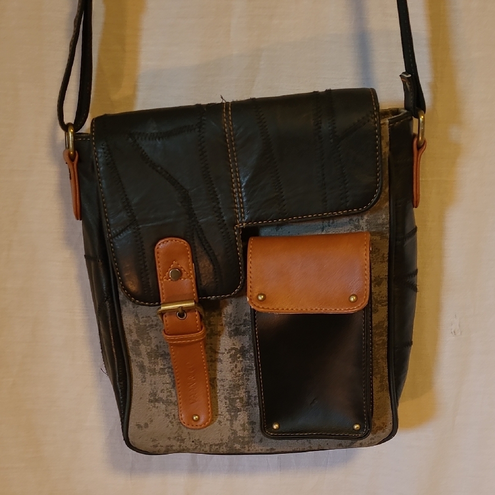 Black Crossbody Bag with Leather Accents and Canvas Texture
